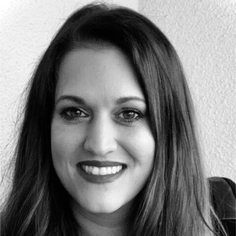 L&D leader reviewing AI training services for learning and development.